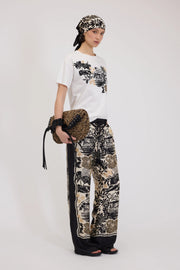 T-SHIRT IN JERSEY CON STAMPA TROPICALE