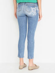 JEANS CON RICAMO FLOREALE