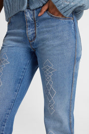 Jeans cinque tasche in denim con microcristalli